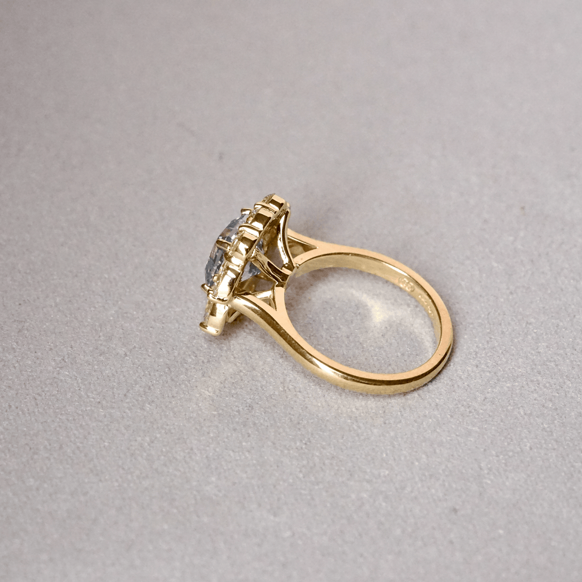 Blue Sapphire and Diamond Cluster Ring in Yellow Gold