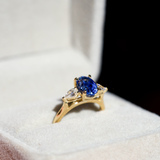 Cornflower Blue Oval Sapphire Trilogy Engagement Ring Yellow Gold