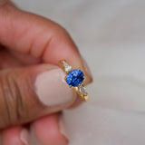 Oval Blue Sapphire Kite Diamond Trilogy Engagement Ring