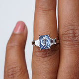 Light Blue Sapphire Trilogy Engagement Ring in Platinum