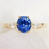 Oval Blue Sapphire Kite Diamond Trilogy Engagement Ring