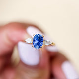 Cornflower Blue Oval Sapphire Trilogy Engagement Ring Yellow Gold