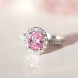 Oval Pink Sapphire Diamond Halo White Gold Ring
