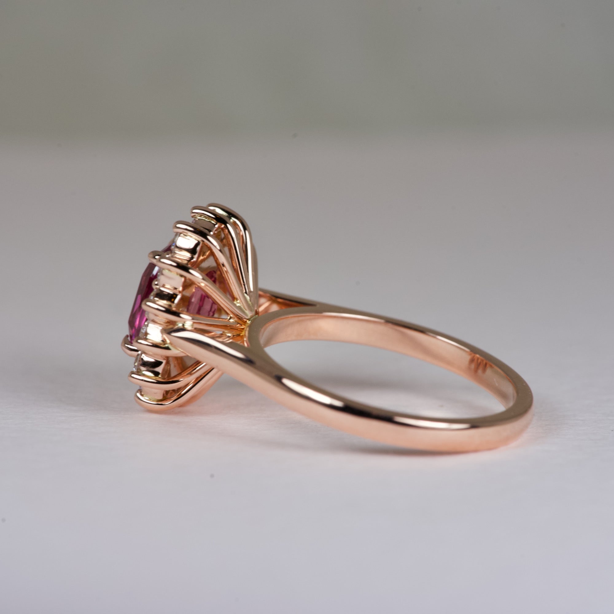 Cushion Pink Sapphire Engagement Ring with Starburst Diamond Halo