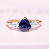 Royal Blue Sapphire Diamond Trilogy Engagement Ring