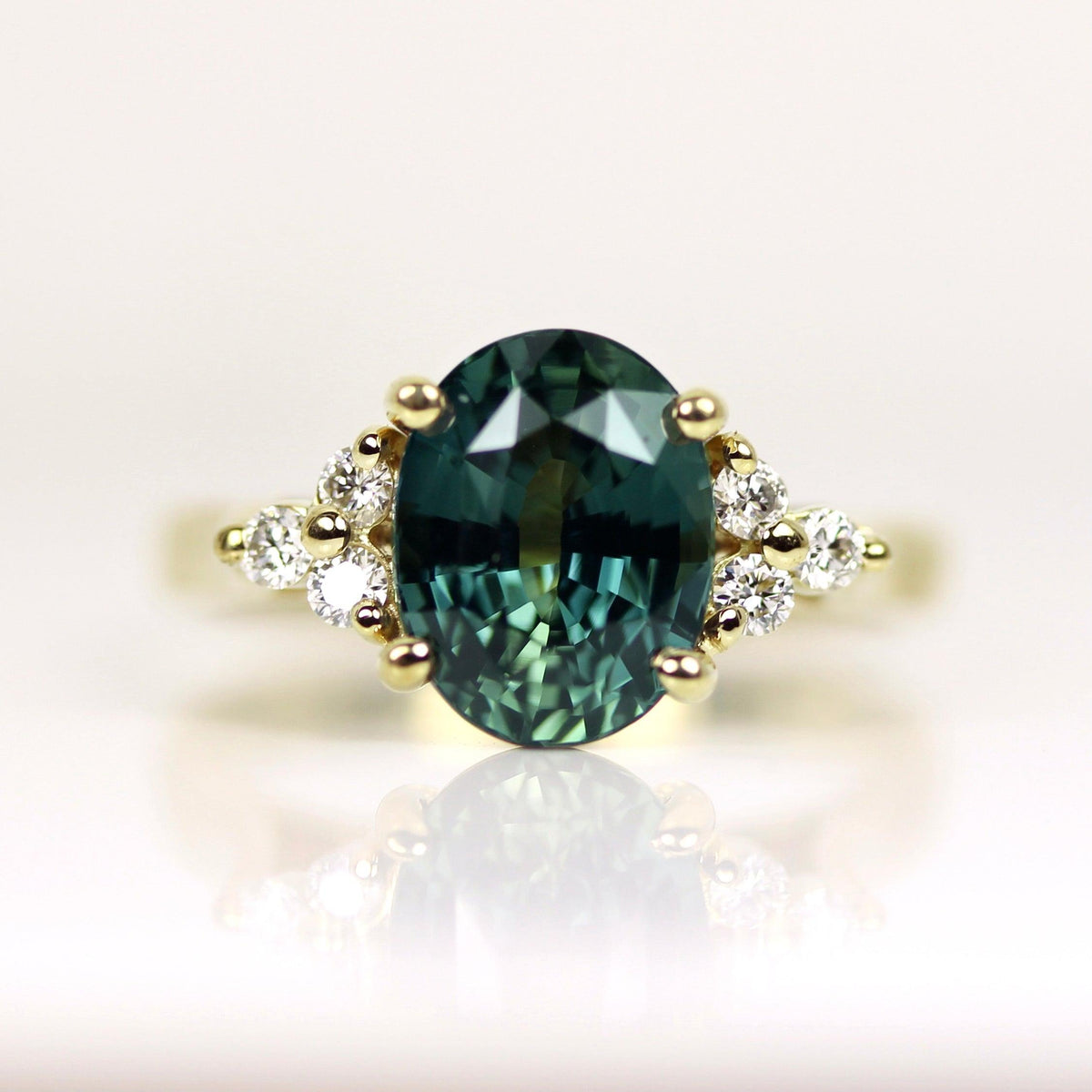 Teal Green Sapphire Engagement Ring in Yellow Gold