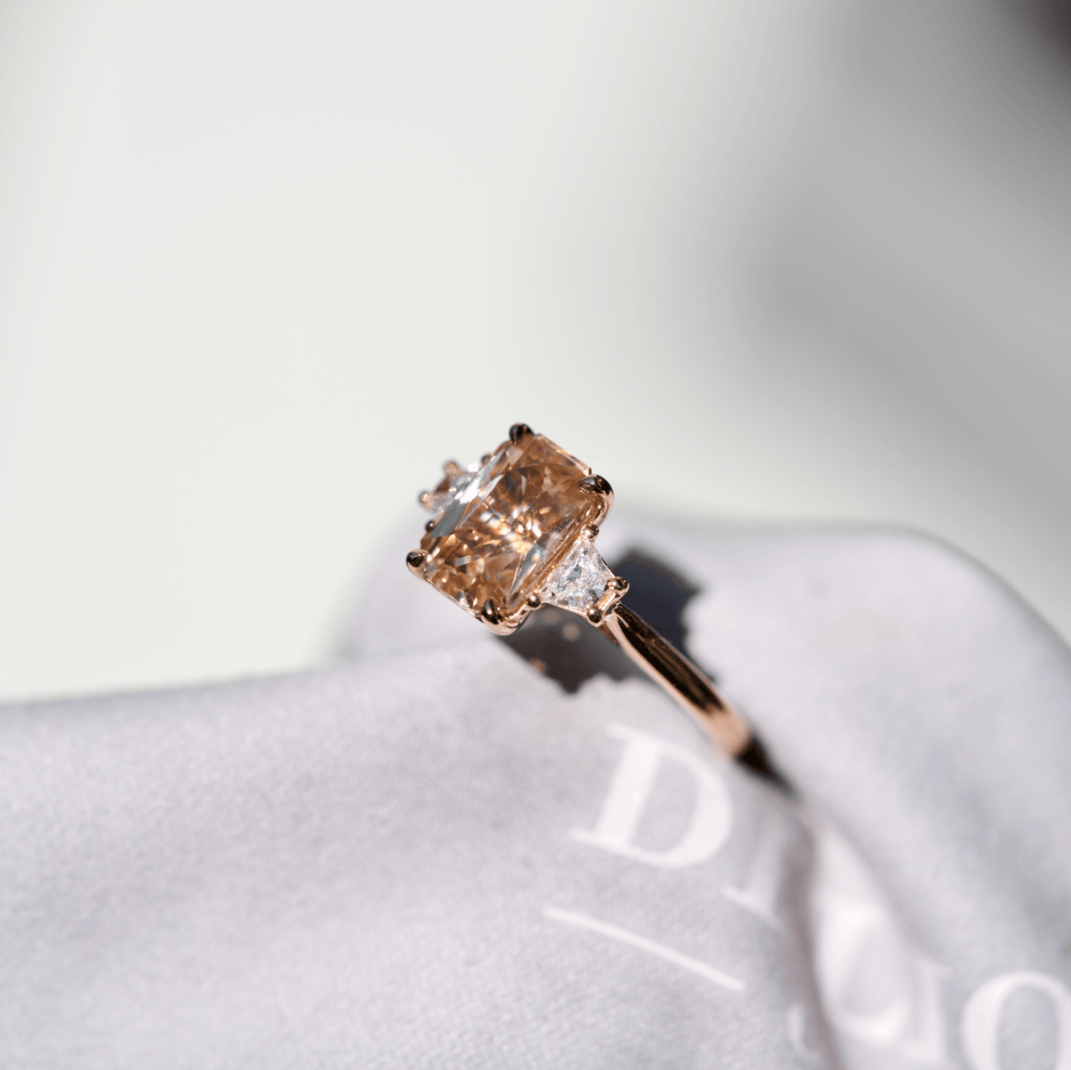 Peach Champagne Sapphire Trilogy Engagement Ring