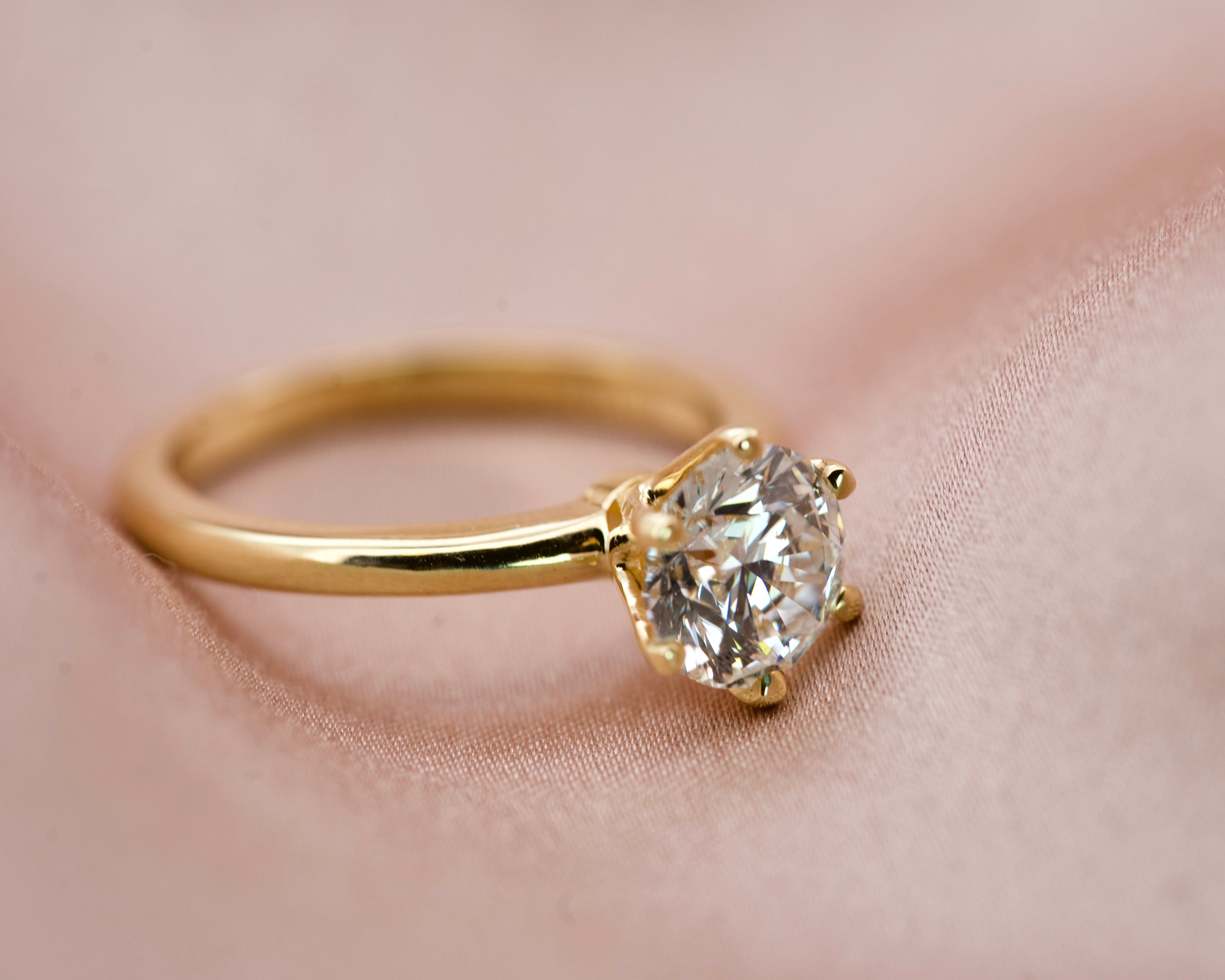 Elegant round diamond solitaire ring handcrafted in Melbourne with a yellow gold band