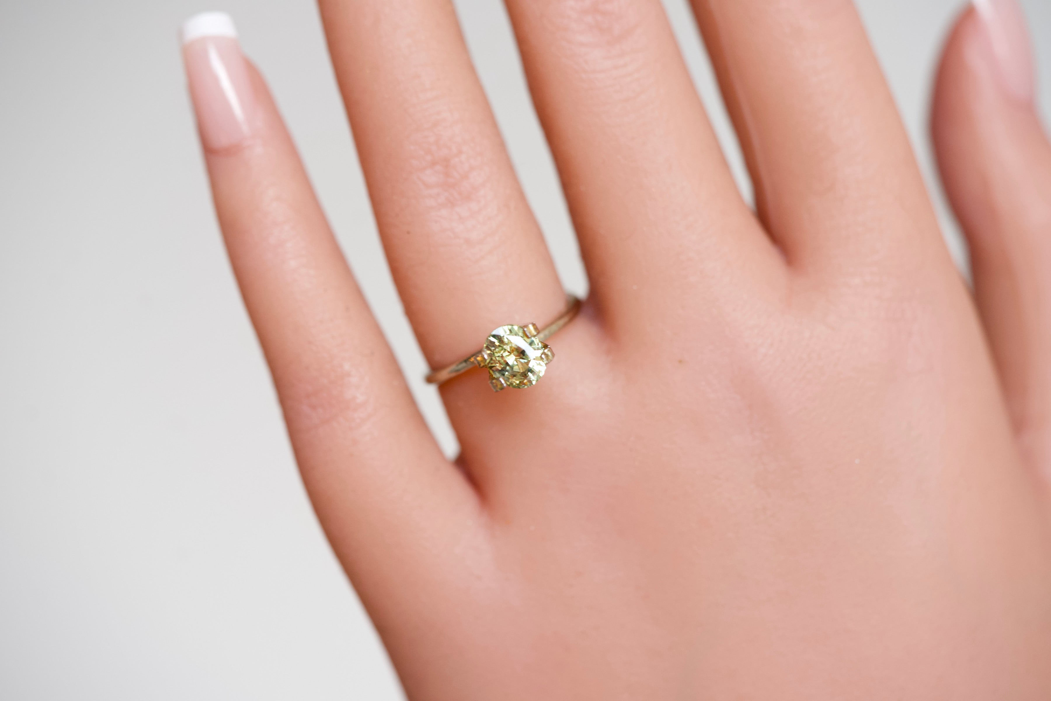 1.55 ct Wattle Green Oval Cut Unheated Sapphire