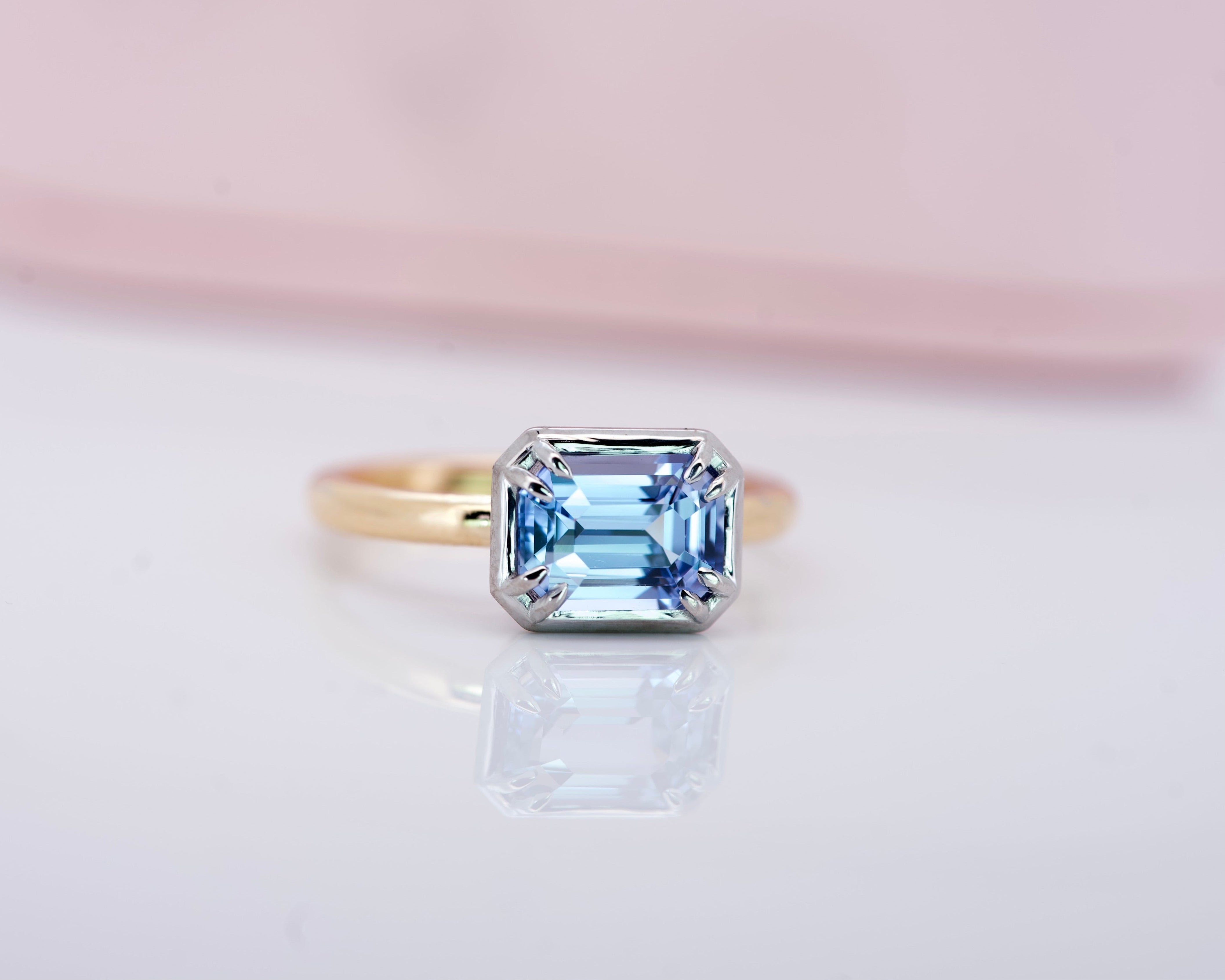 Emerald cut sapphire ring in natural light