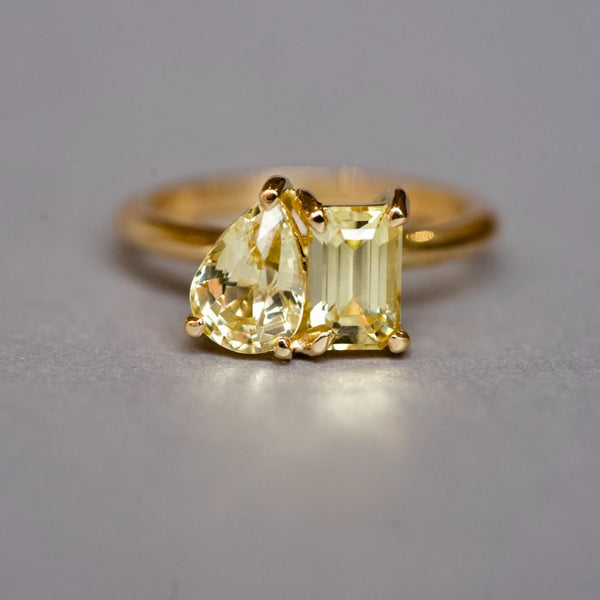 Pear and emerald cut yellow sapphire Toi et Moi ring