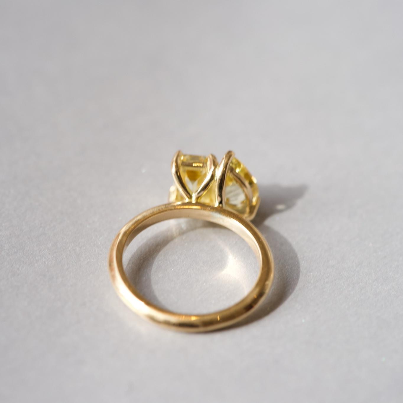 Pear and emerald cut yellow sapphire Toi et Moi ring