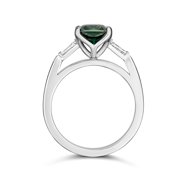 Teal sapphire and diamond three-stone ring in platinum