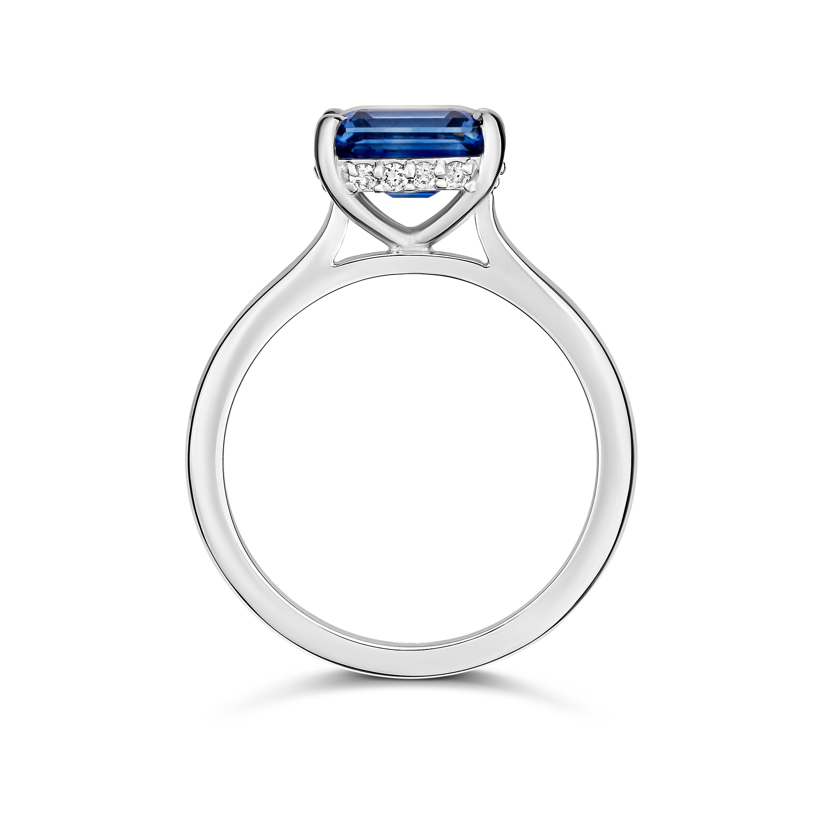 Blue sapphire platinum engagement ring with diamond detail