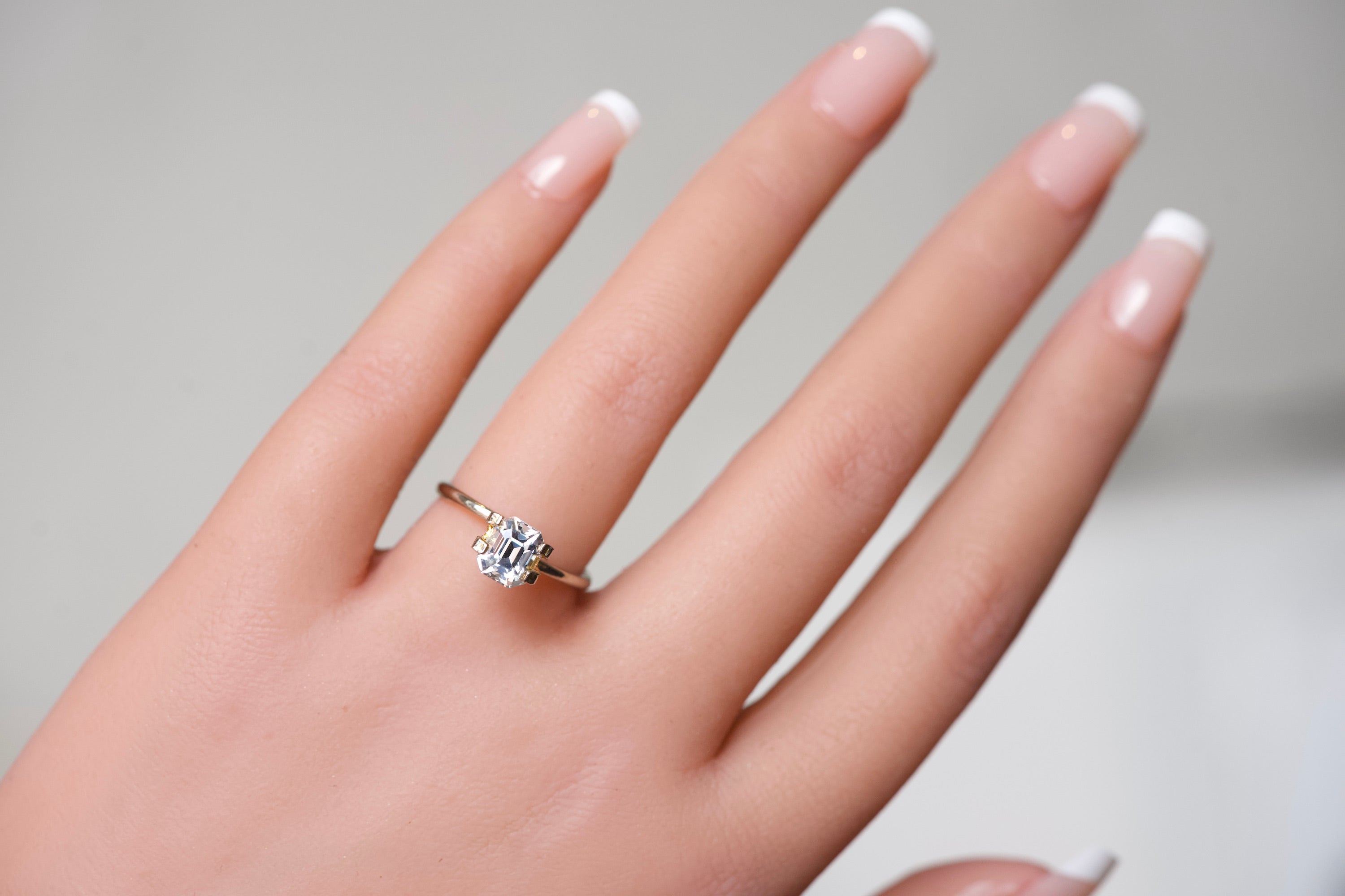 heated emerald cut sapphire gem