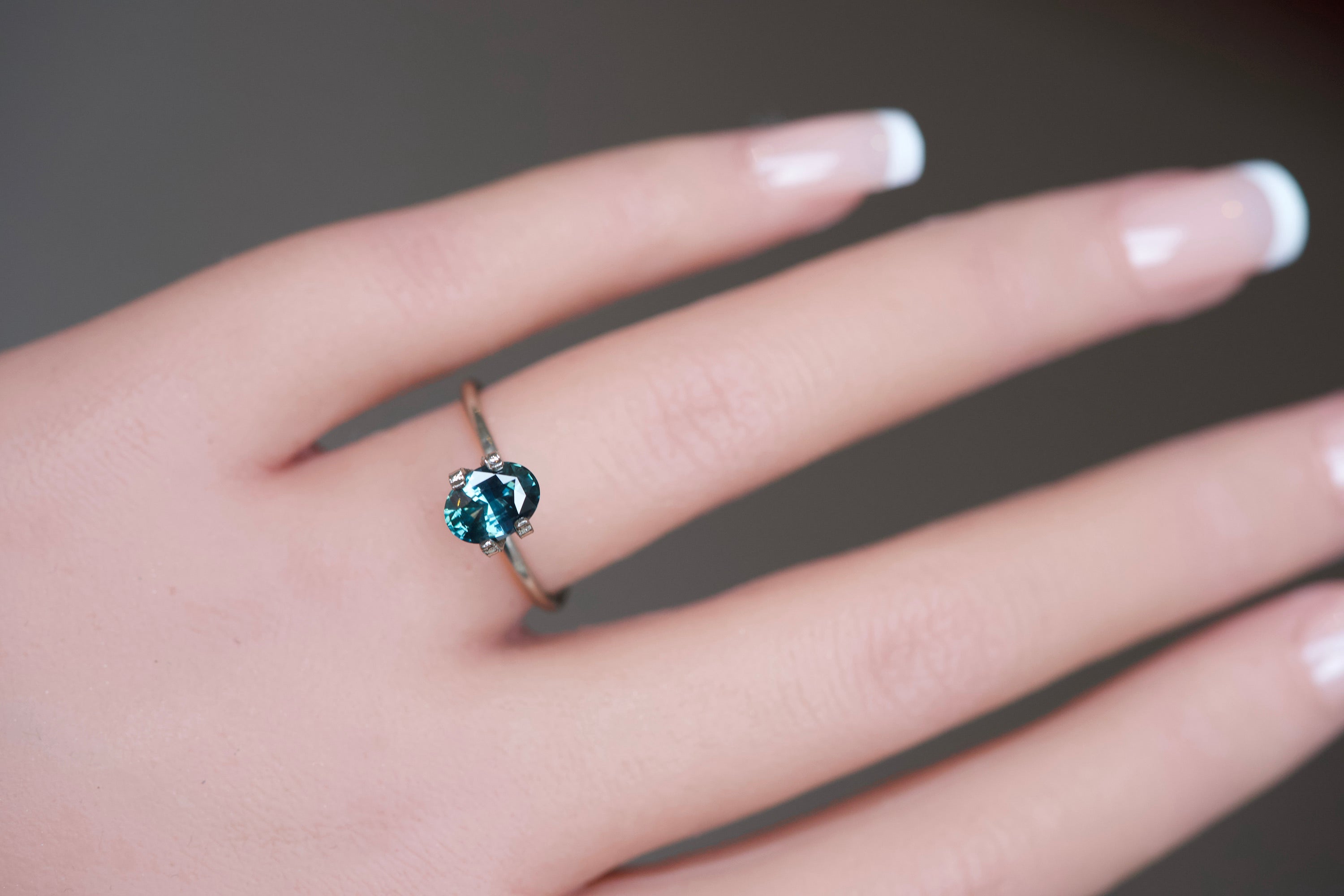 Heated Bluish Green Oval cut sapphire gem