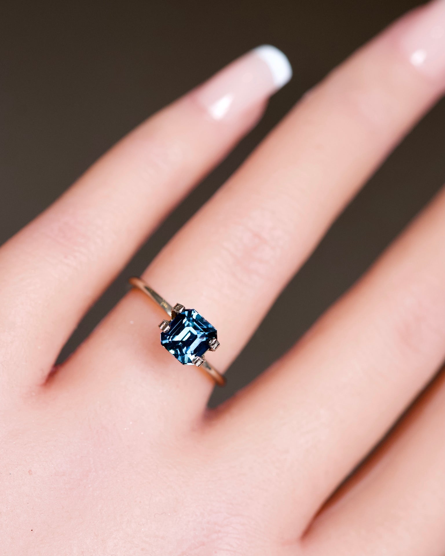 Bluish Green sapphire in Emerald Cut 