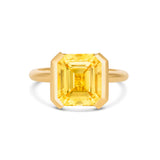 Emerald Cut Yellow Sapphire Half Bezel Set Ring