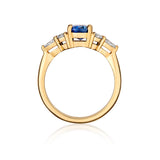 Blue sapphire cluster ring side profile in yellow gold