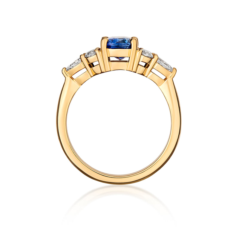 Blue sapphire cluster ring side profile in yellow gold