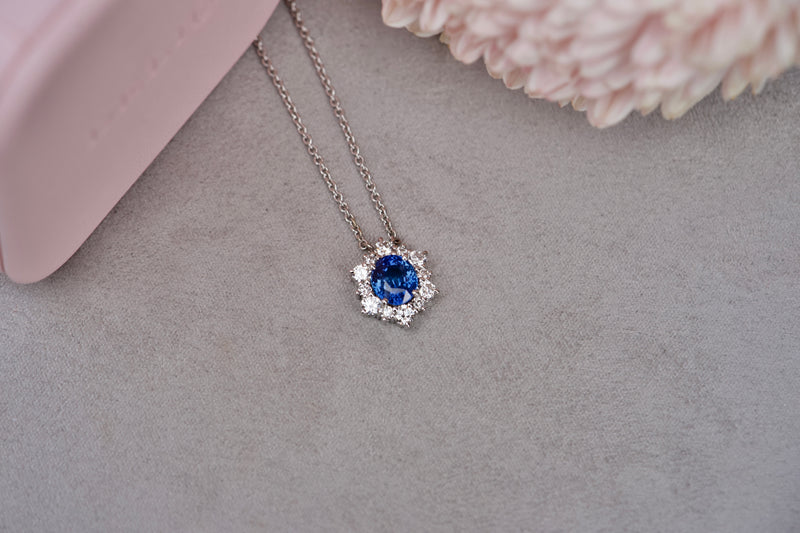 Blue sapphire snowflake pendant with diamonds on chain