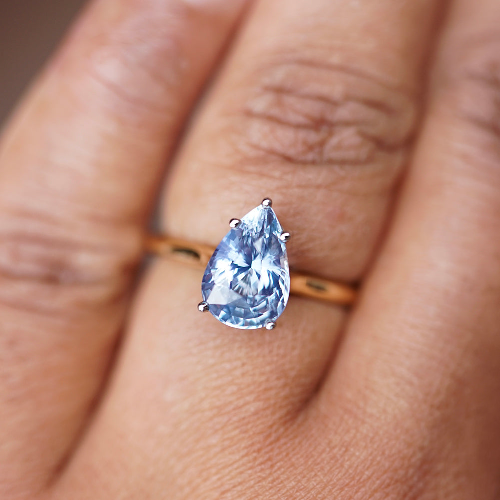 on-hand custom blue ceylon pear sapphire ring in white and yellow gold