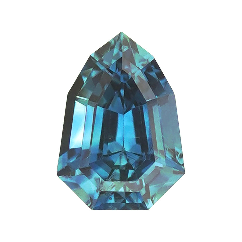 Elongated geometric fancy-cut sapphire in deep blue and teal tones.