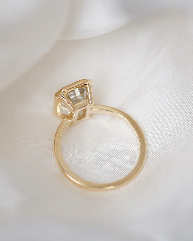 Champagne sapphire bezel ring side view showing gallery