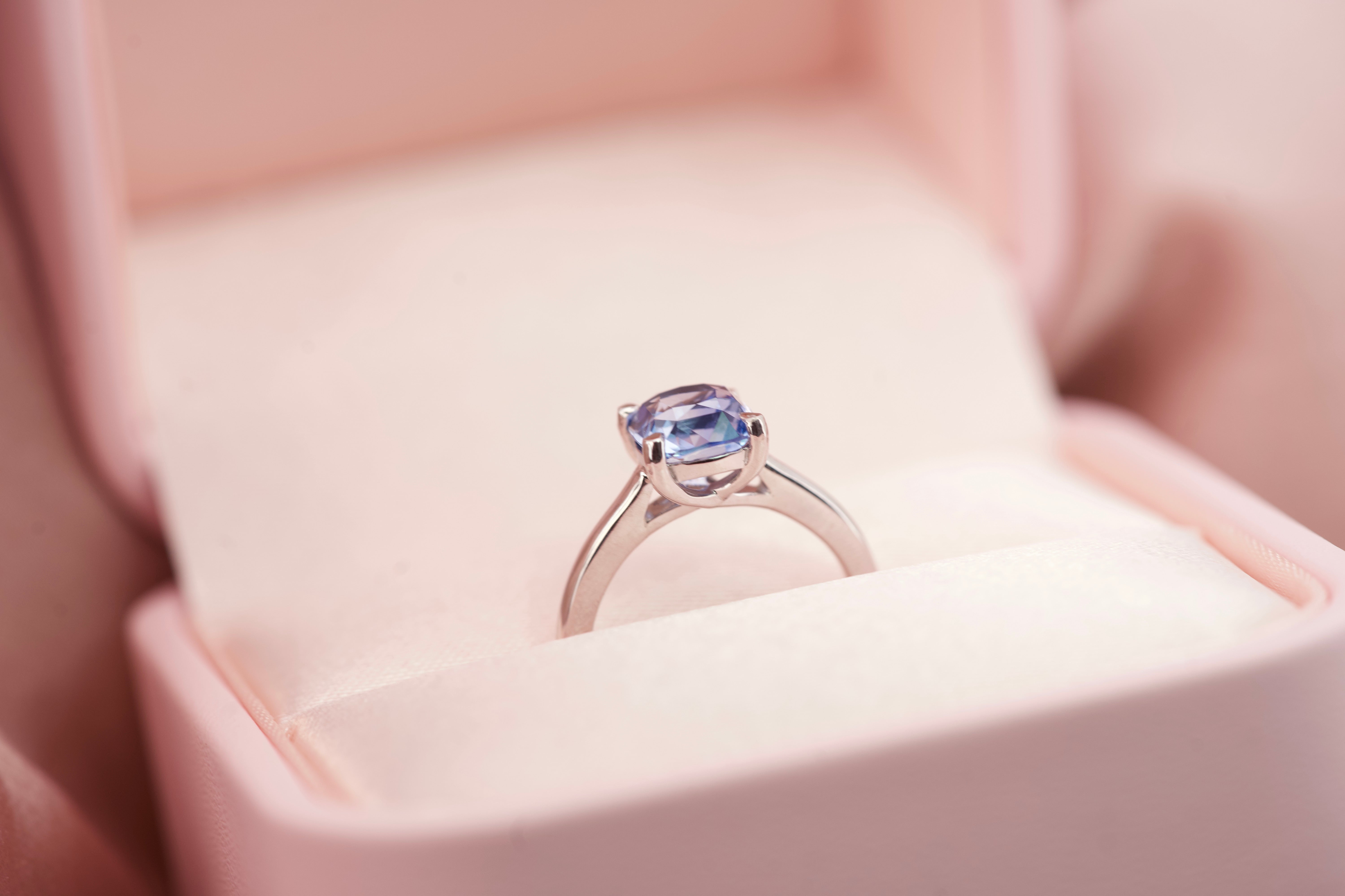 Macro shot of a cornflower blue cushion sapphire highlighting its natural unheated brilliance