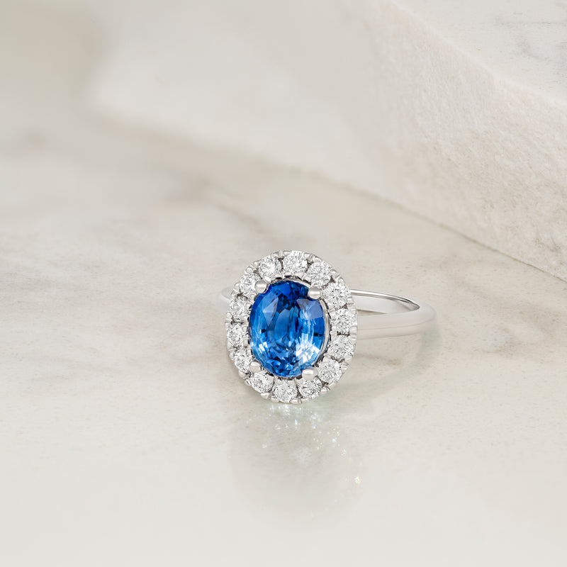 Blue Sapphire Diamond Halo Engagement Ring