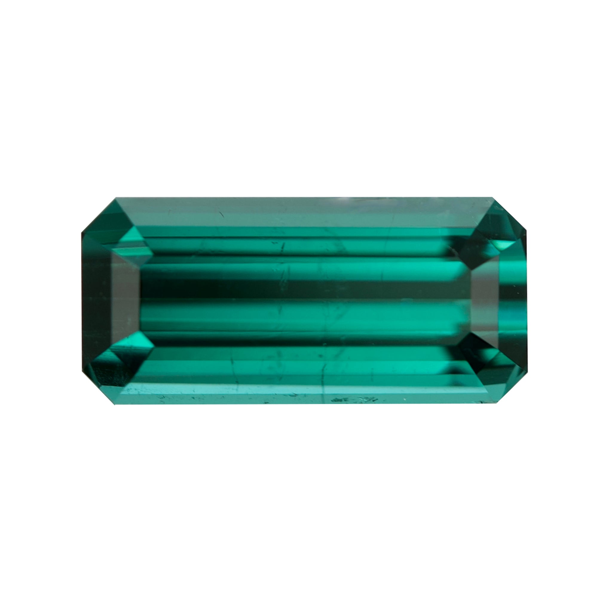 High-clarity elongated sea-green tourmaline with truncated corners.