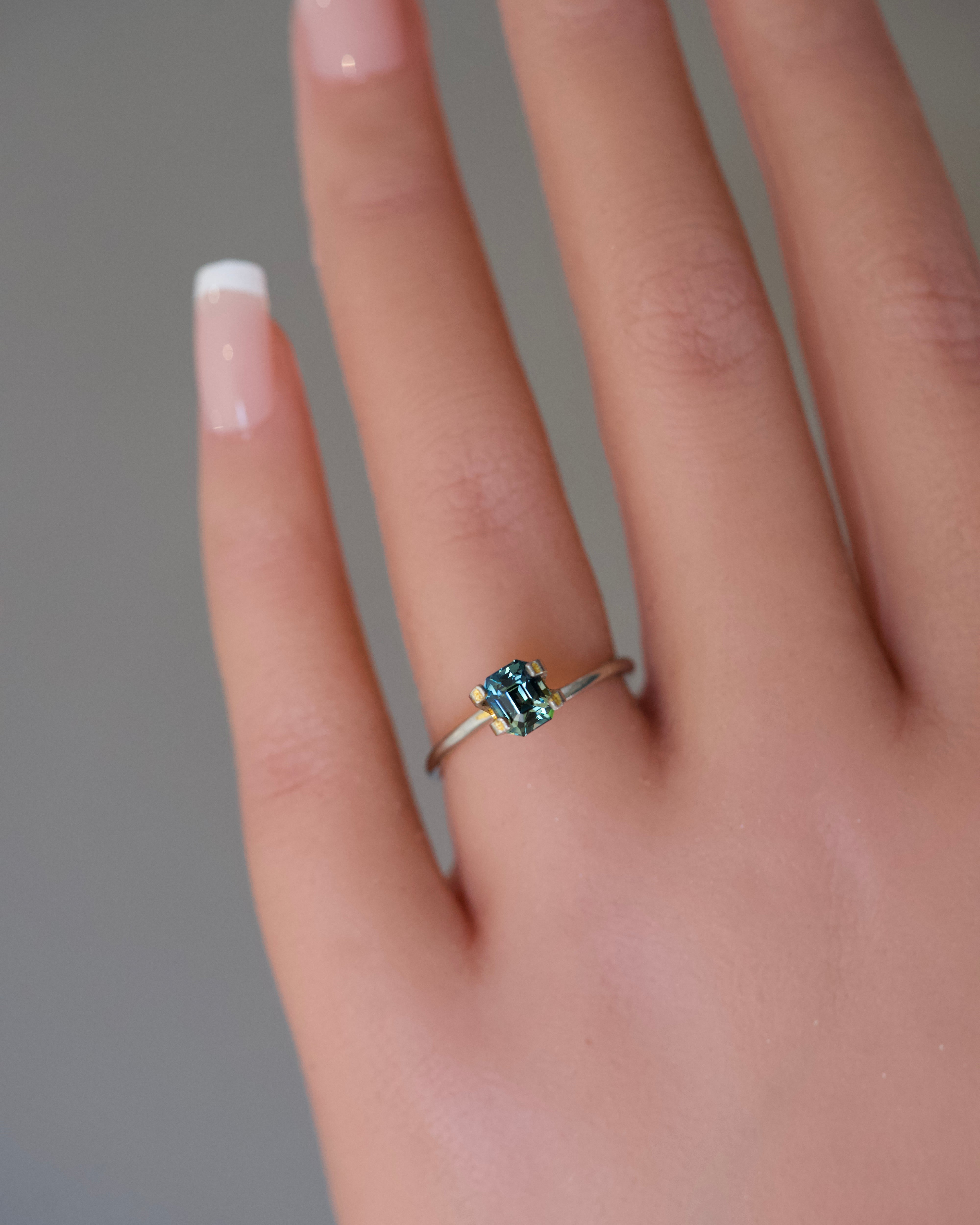 emeralad cut bluish green sapphire