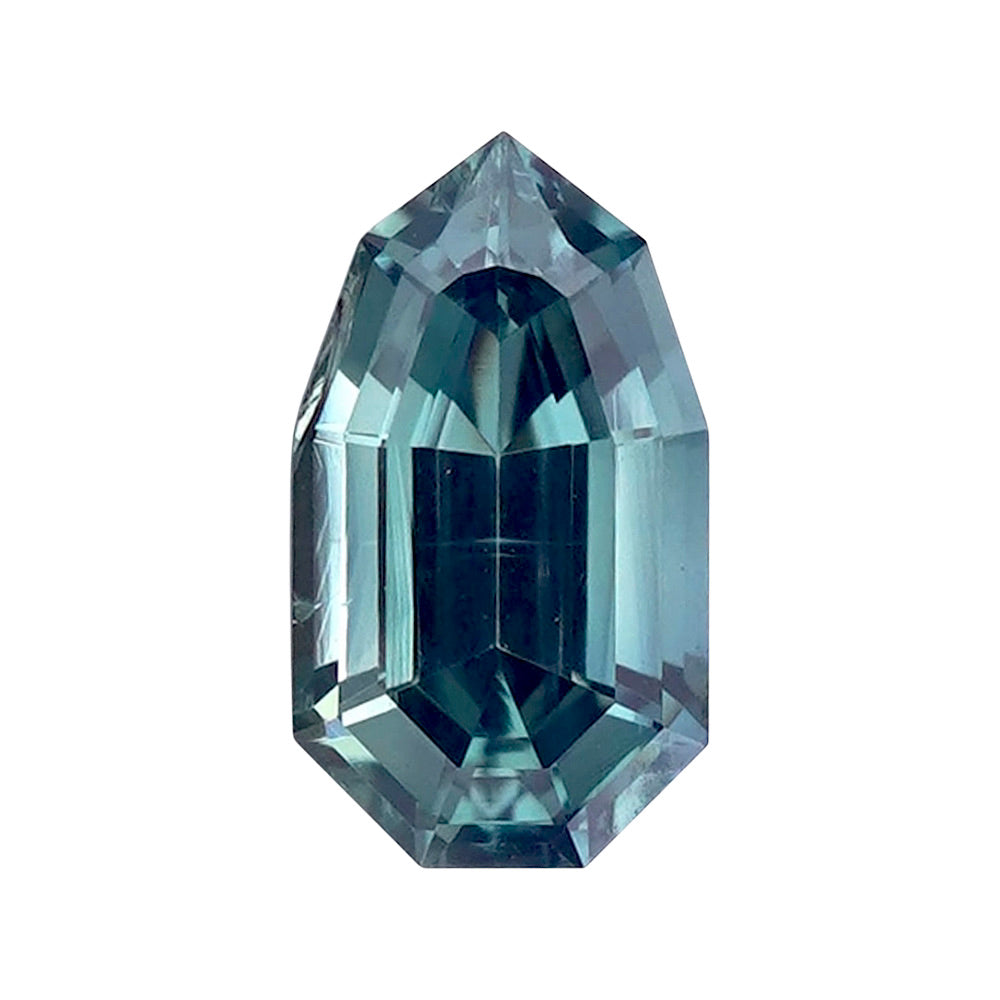 Elongated geometric fancy step-cut grayish blue crystal isolated on a crisp white background.
