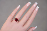 5.52 ct cushion cut natural purplish red garnet
