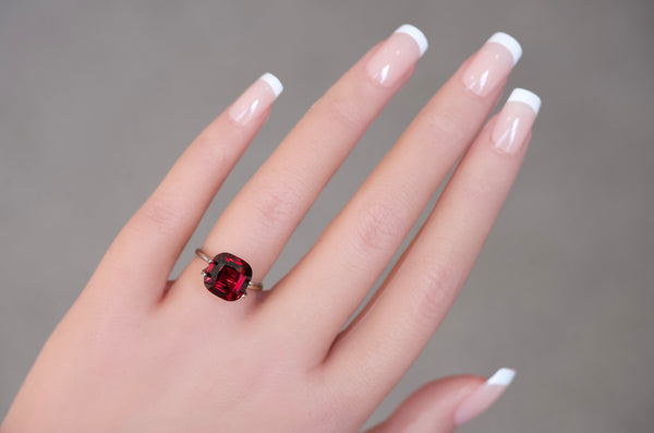 5.52 ct cushion cut natural purplish red garnet