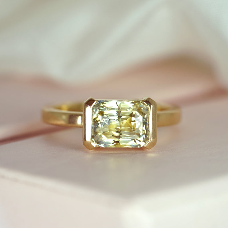 East West Half Bezel Set Sapphire Ring Greenish Yellow Sapphire