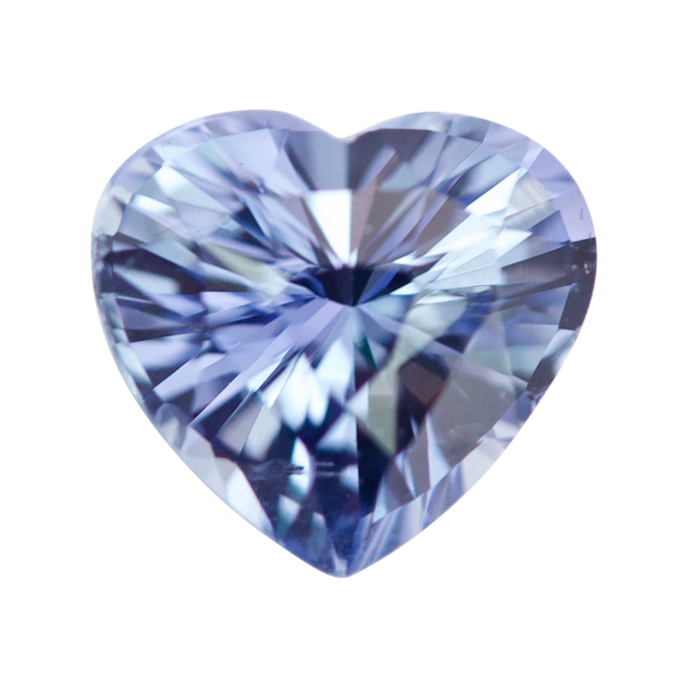 Loose bluish-violet heart-shaped sapphire against a white background.