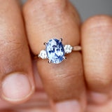 Vivid Medium Blue Oval Sapphire Diamond Platinum Trilogy Engagement Ring