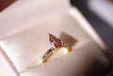 Pear shaped pink sapphire ring in yellow gold, in box
