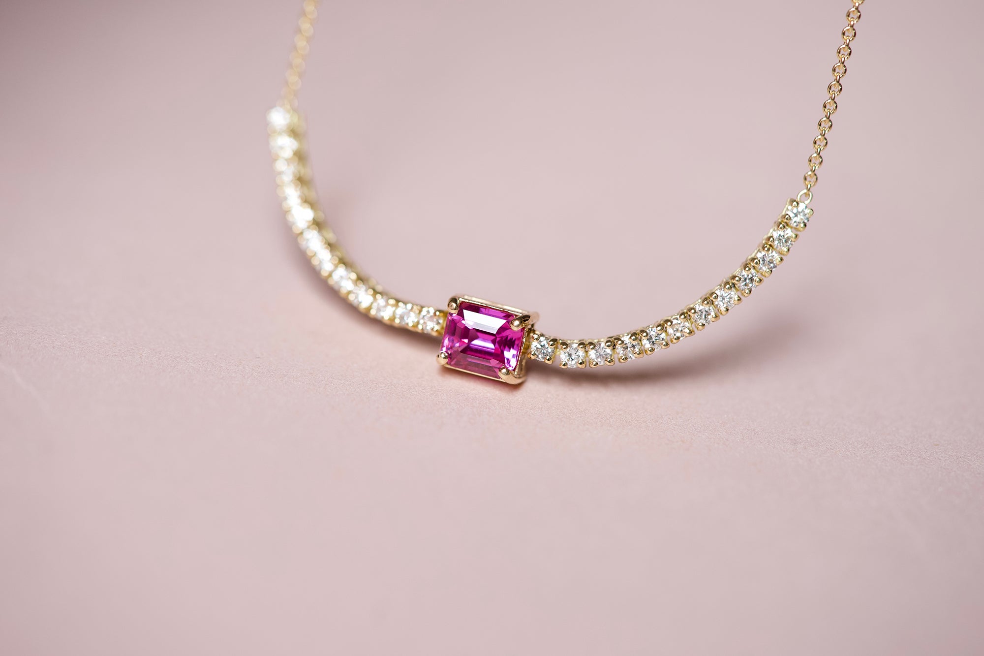 Emerald cut pink sapphire tennis necklace detail