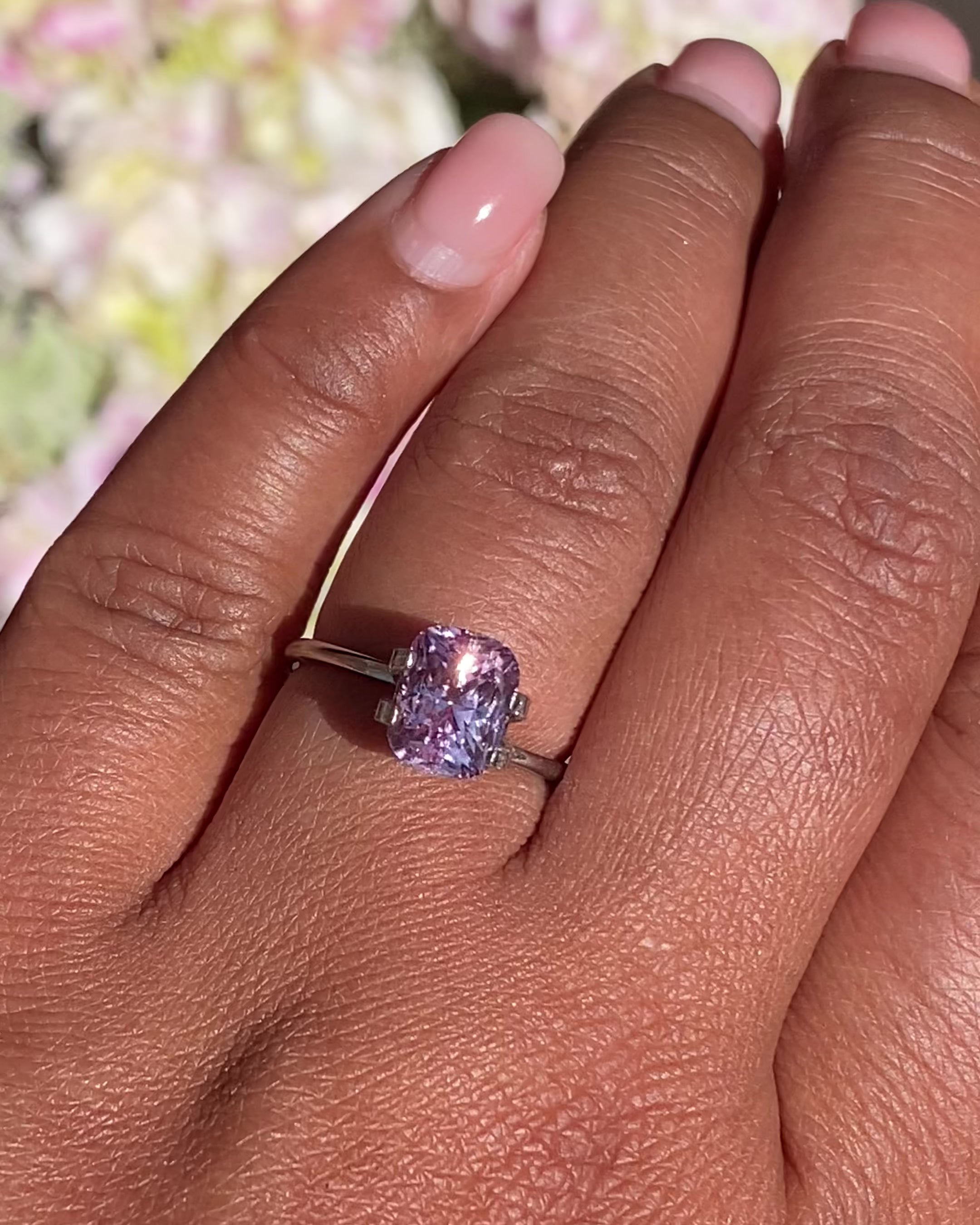pink cushion cut sapphire at Deliqa Gems on hand video