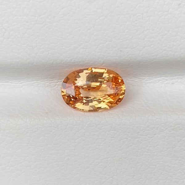 1.54	ct Apricot Sapphire Oval Natural Heated