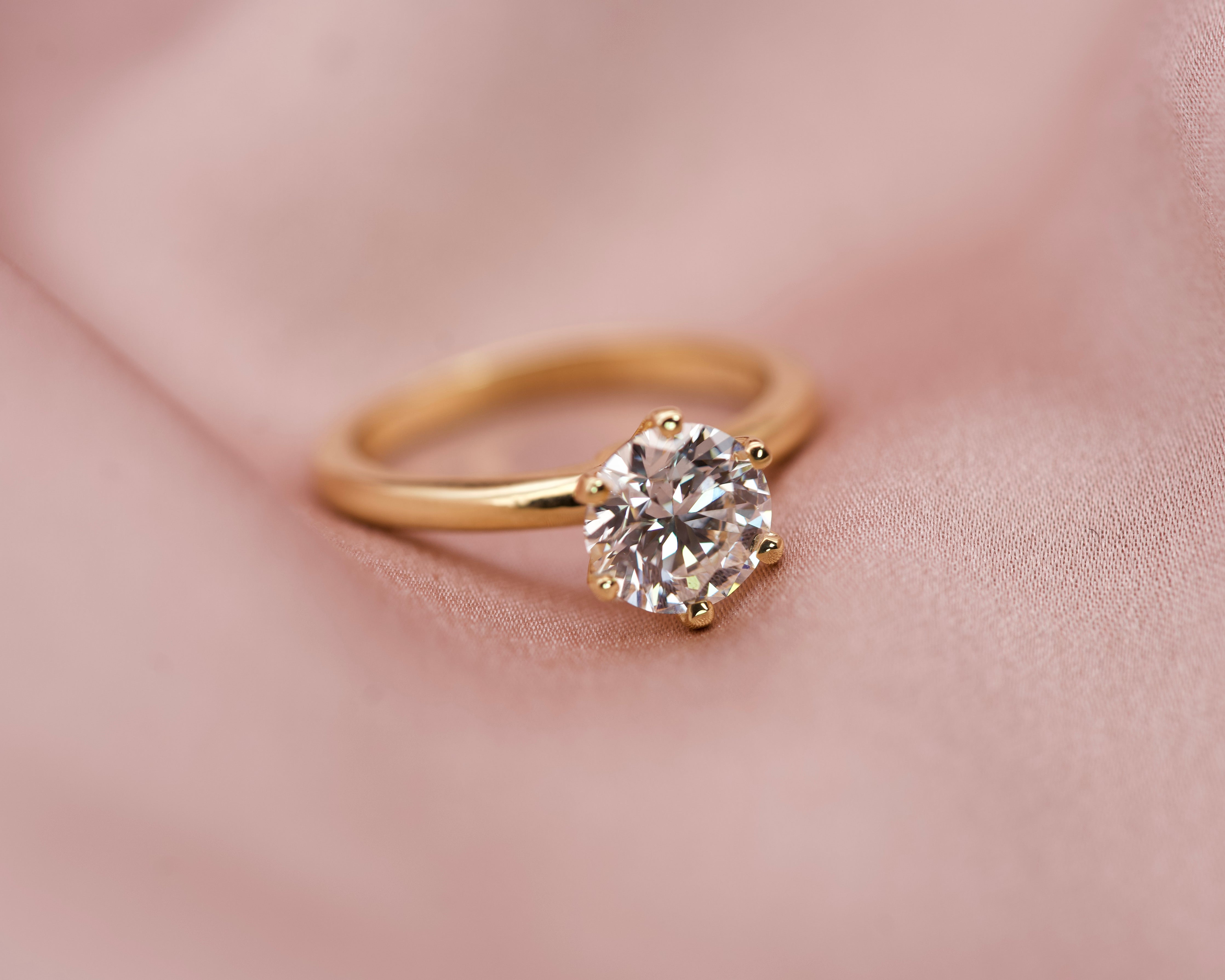 1.50ct round brilliant diamond solitaire ring in an 18k yellow gold six-prong setting
