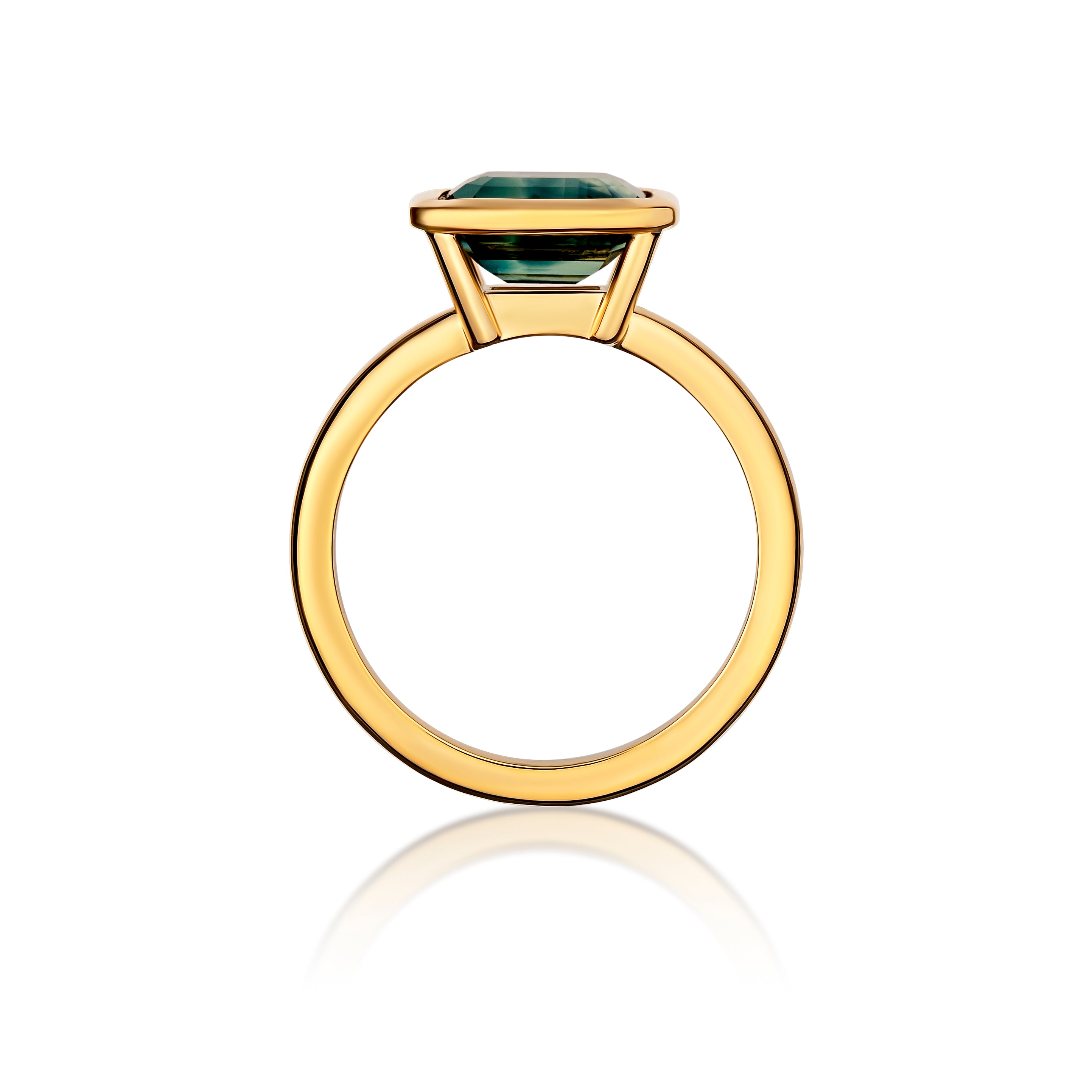 Bluish green sapphire east-west bezel ring, side view