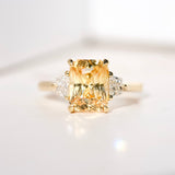 Apricot Sapphire Trapezoid Diamond Trilogy Engagement Ring