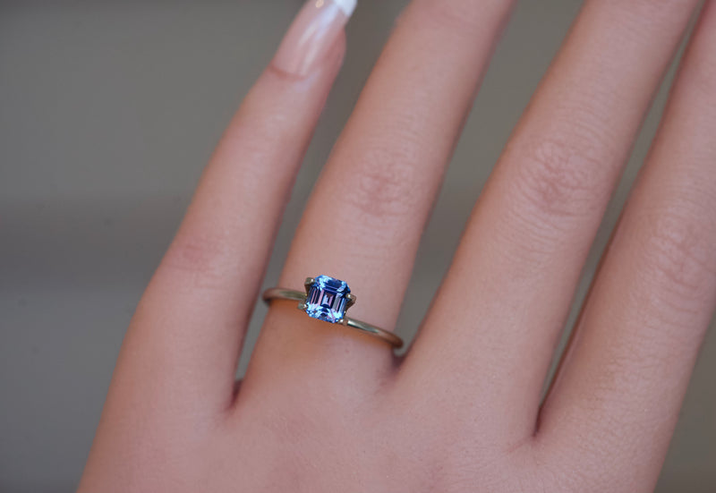 rectangular step cut 1.18 carat blue sapphire gem