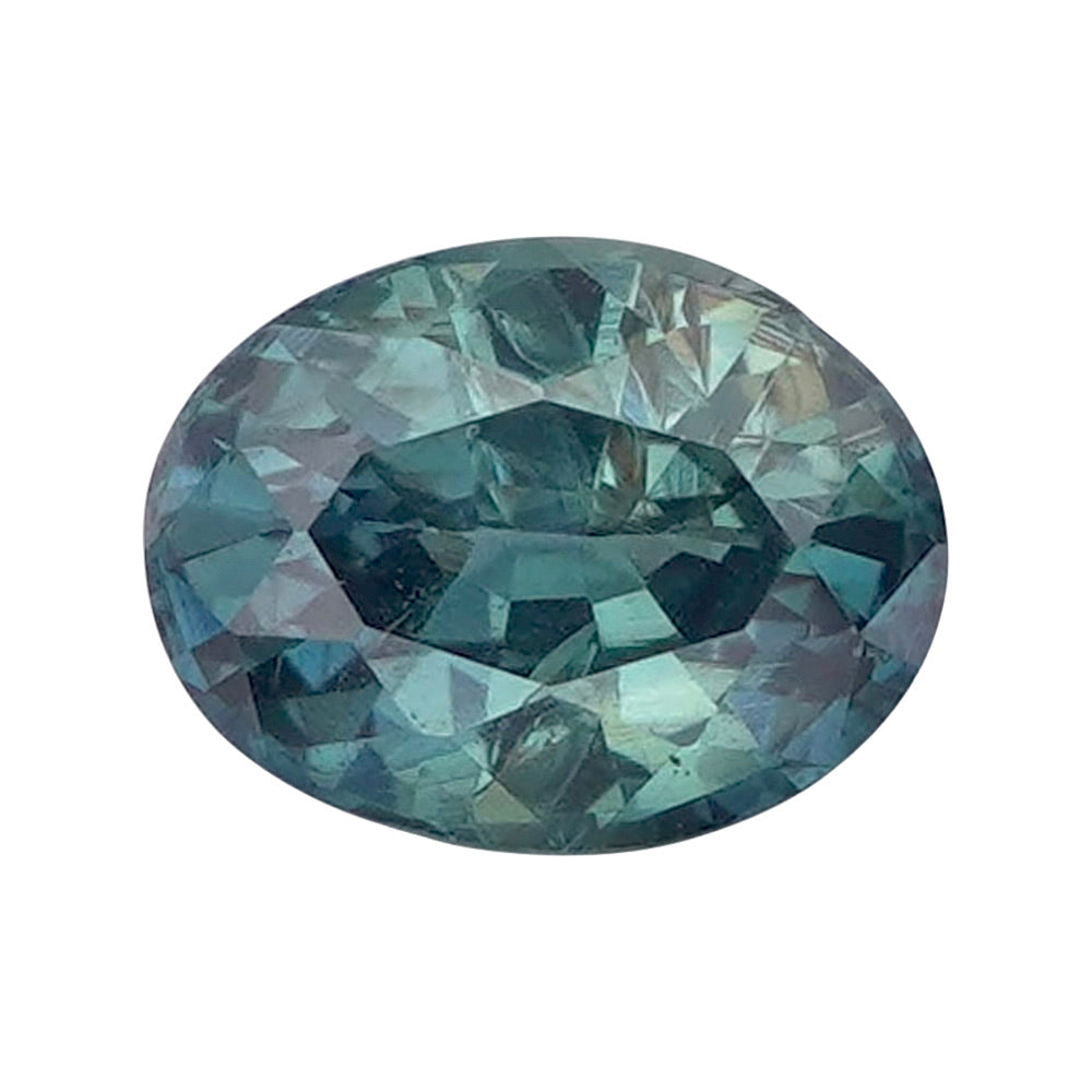 Oval mixed-cut loose gemstone displaying a grayish green-blue saturation.