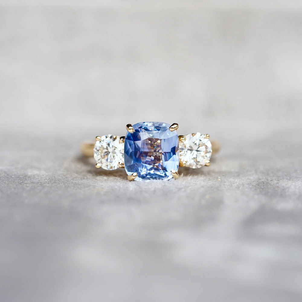 Vivid Sky Blue Cushion Sapphire and Diamond Trilogy Ring and Studs