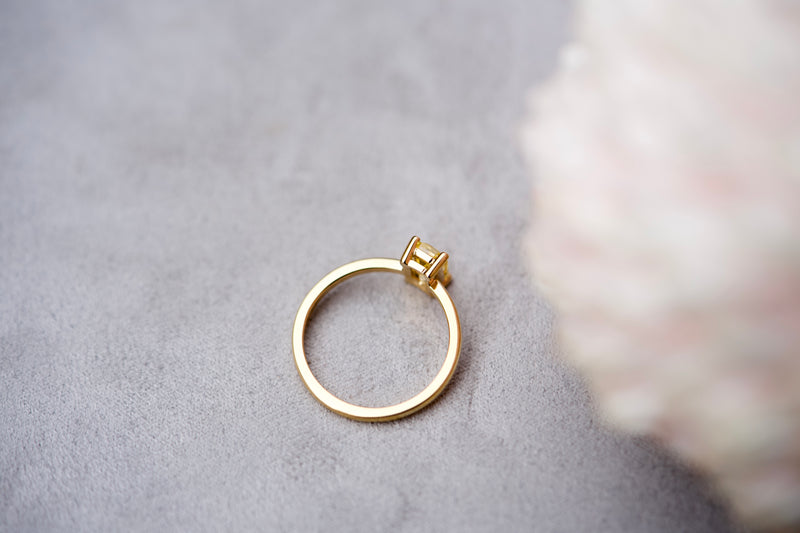 Yellow sapphire emerald cut ring, aerial view