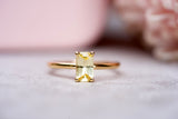 Ceylon yellow sapphire solitaire ring on fabric